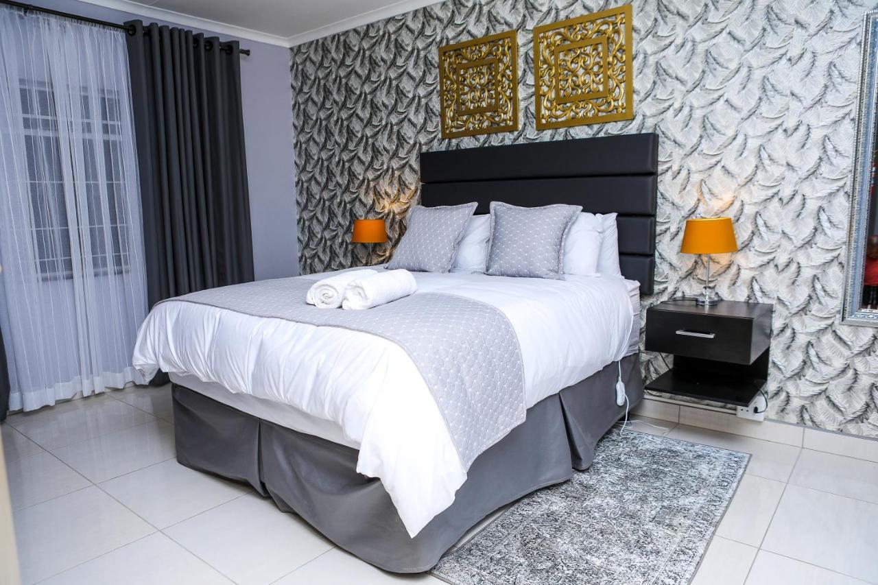 Delux Guesthouse Volksrust ภายนอก รูปภาพ